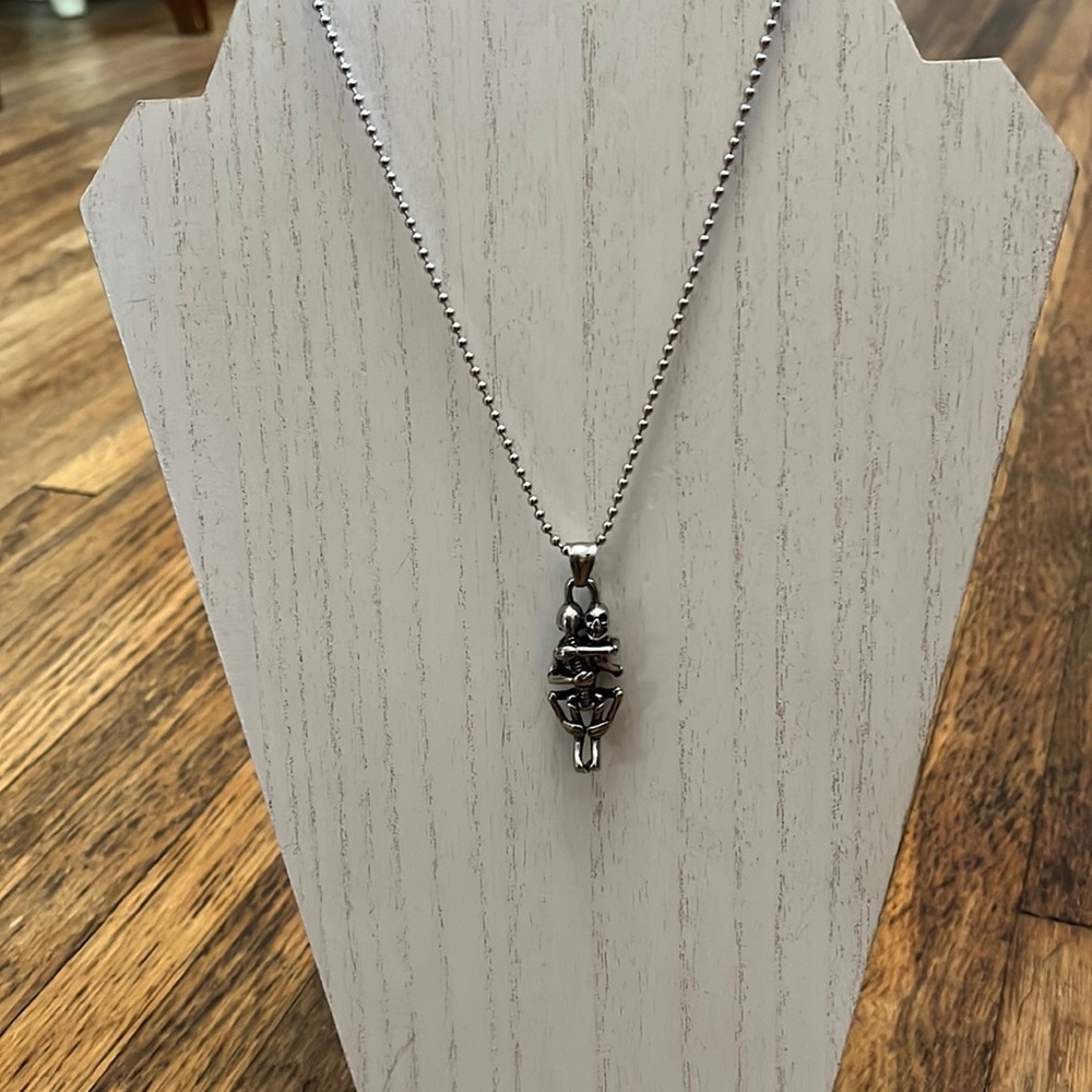 NWOT “Love Me Forever” Skull Necklace.